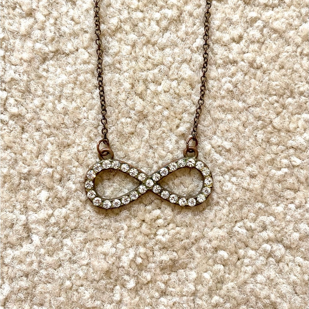 Claire’s Embellished Infinity Necklace